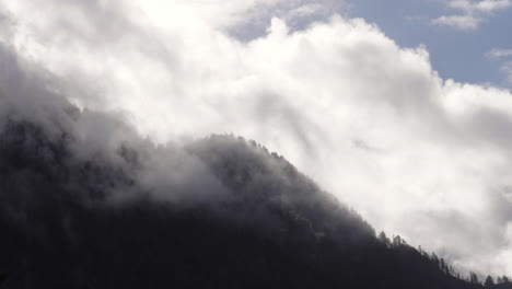 clouds moving across mountainside in oregon