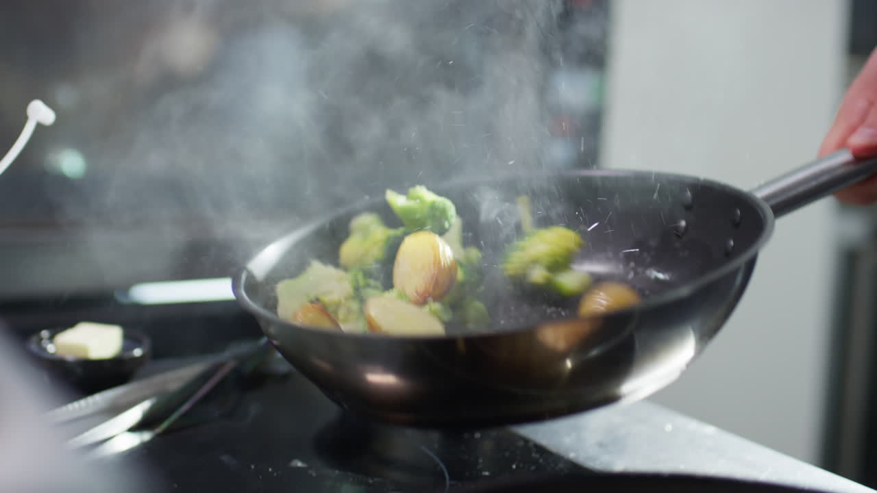 Frying Broccoli and Potato on Skillet