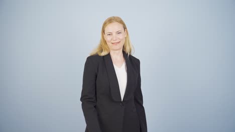 business woman happily speaking to camera.