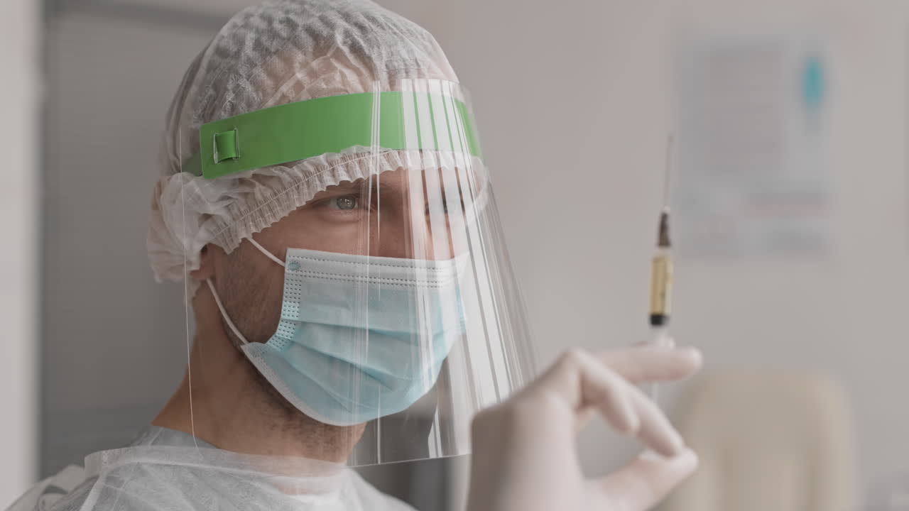 remover las burbujas de aire de la jeringa