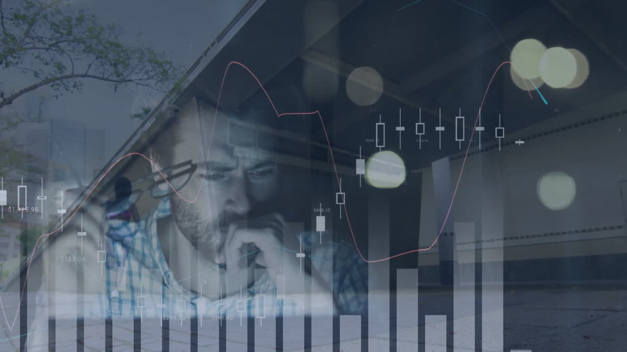 Analyzing financial graphs, man in office with city animation in background
