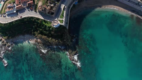 Aerial-Birds-Eye-View-Over-Punta-Petrolo-With-Waves-Break-On-Coastline-In-Castellammare-Del-Golfo