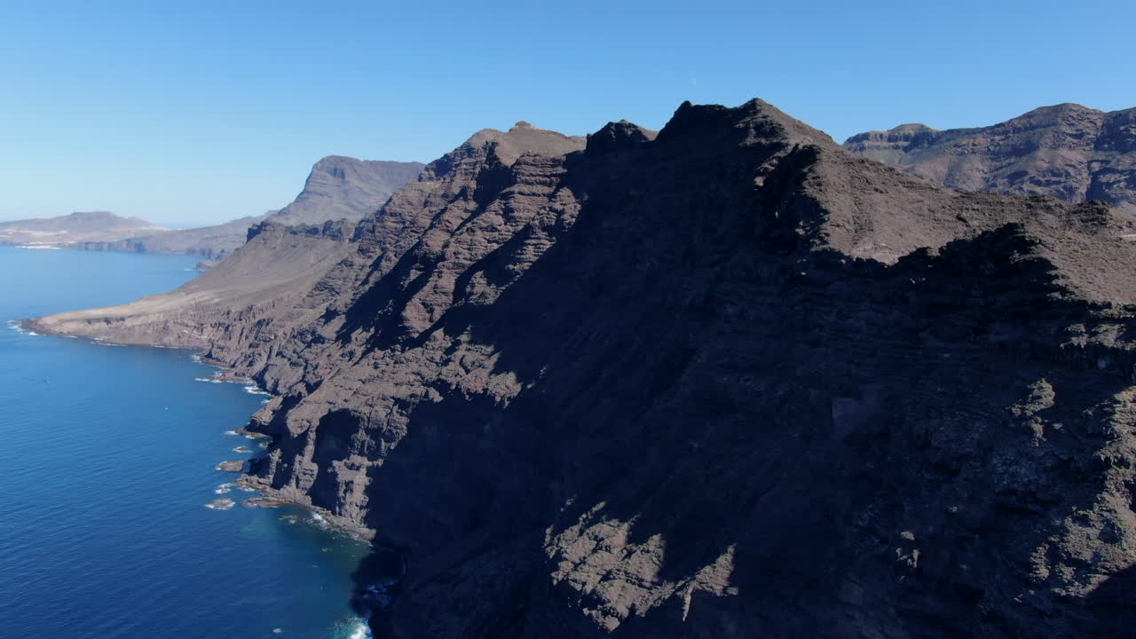 Aerial shot near the slope of the mountains that forms the dragon's tail, in the village of San Nicolas, Gran Canaria