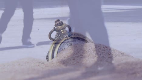 Composite-video-of-sand-falling-over-a-stopwatch-against-time-lapse-of-people-walking-on-the-street