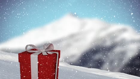 Animation-Von-Schnee,-Der-über-Weihnachtsgeschenk-Fällt