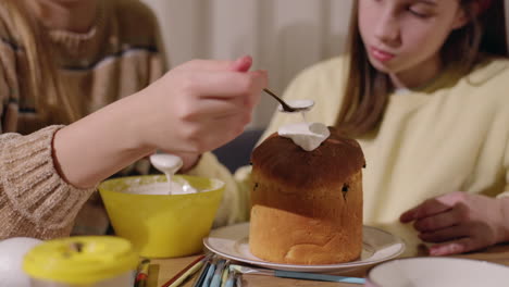 kids decorating easter bread