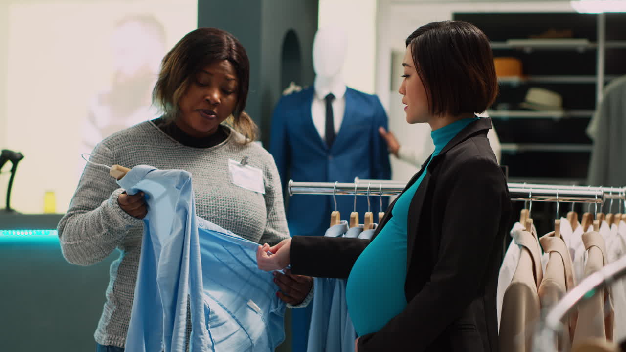 Pregnant Woman Shopping in Clothing Store