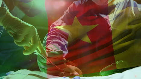 animation of waving senegal flag over team of diverse surgeons performing operation at hospital