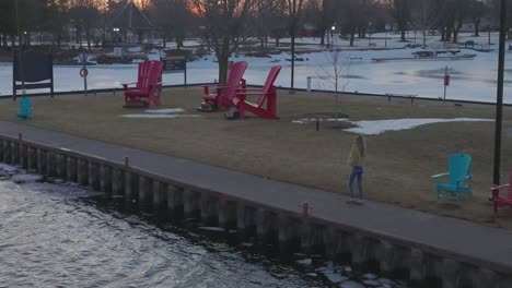 young-women-enjoying-a-late-winter-evening-without-snow-aerial-looking-at-camera