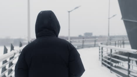 man walking alone outdoors