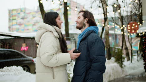 man dancing with his girlfriend outdoors