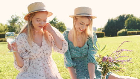 two friends enjoying a picnic in the park