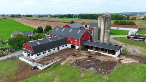 american farm in rural usa with livestock and fields during early autumn