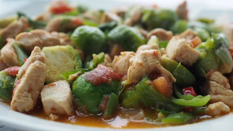 chicken and brussel sprouts with tomato sauce