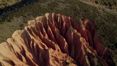 Drone-aerial-view-of-Las-Cárcavas-sharp-sand-rocks-In-Madrid,-Spain