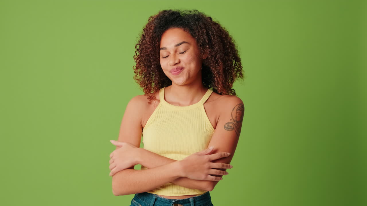 Portrait of a woman hugging herself