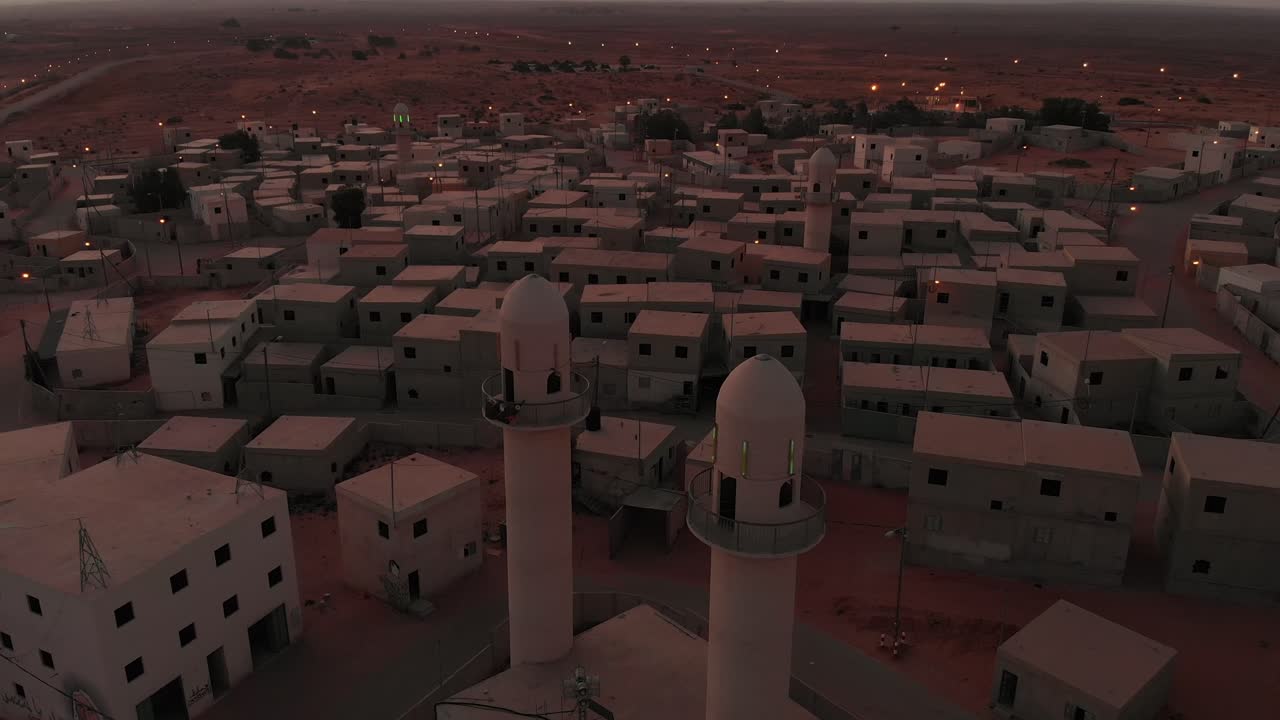 aerial view of two beatiful old mosques at palestine empty city in the morning.