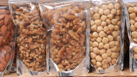 close-up shot of a variety of nuts in bags