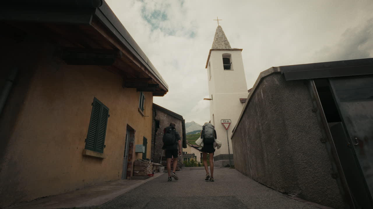 Hikers in a European Village
