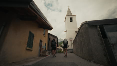 hikers in a european village