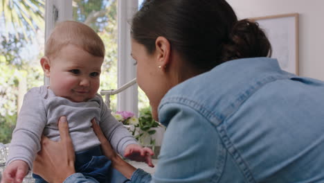 happy mother playing with baby at home loving mom nurturing toddler having fun parent enjoying motherhood