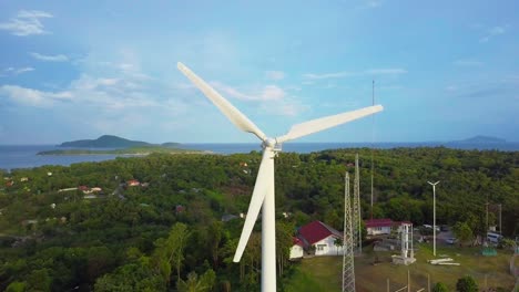 aerial drone shot: aerial 4k birds eye view on wind power / windmill