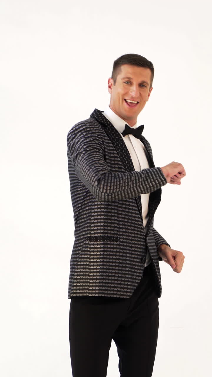 cheerful toast-master is gesticulating and posing at the celebration. Parody of the show program of leading Vertical video