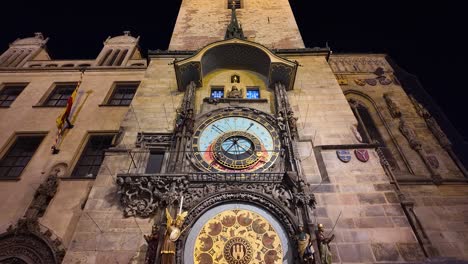 prague's astronomical clock tower at night, showcasing its historic architecture and illuminated facade