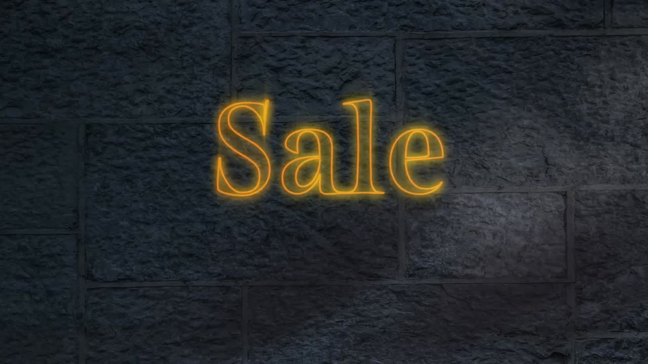 texto de venta de neón amarillo contra contra pared de ladrillo gris en el fondo