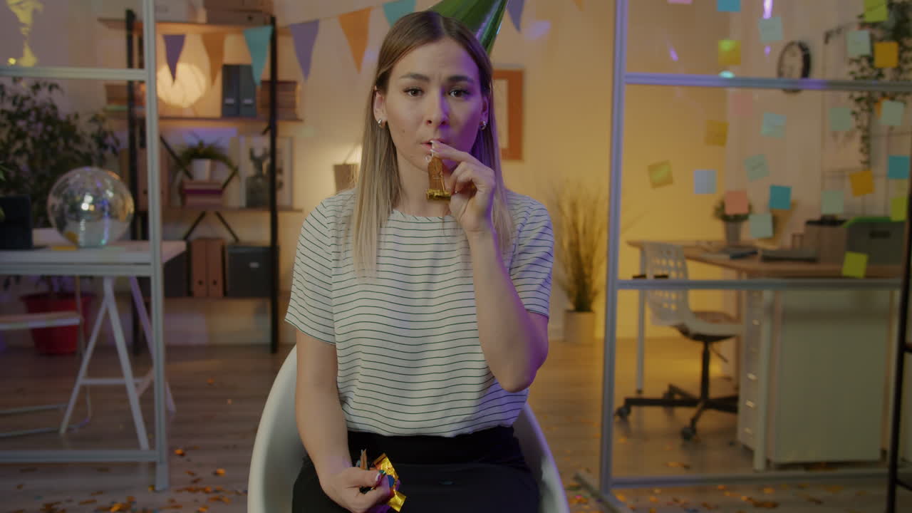 Woman Celebrating at an Office Party