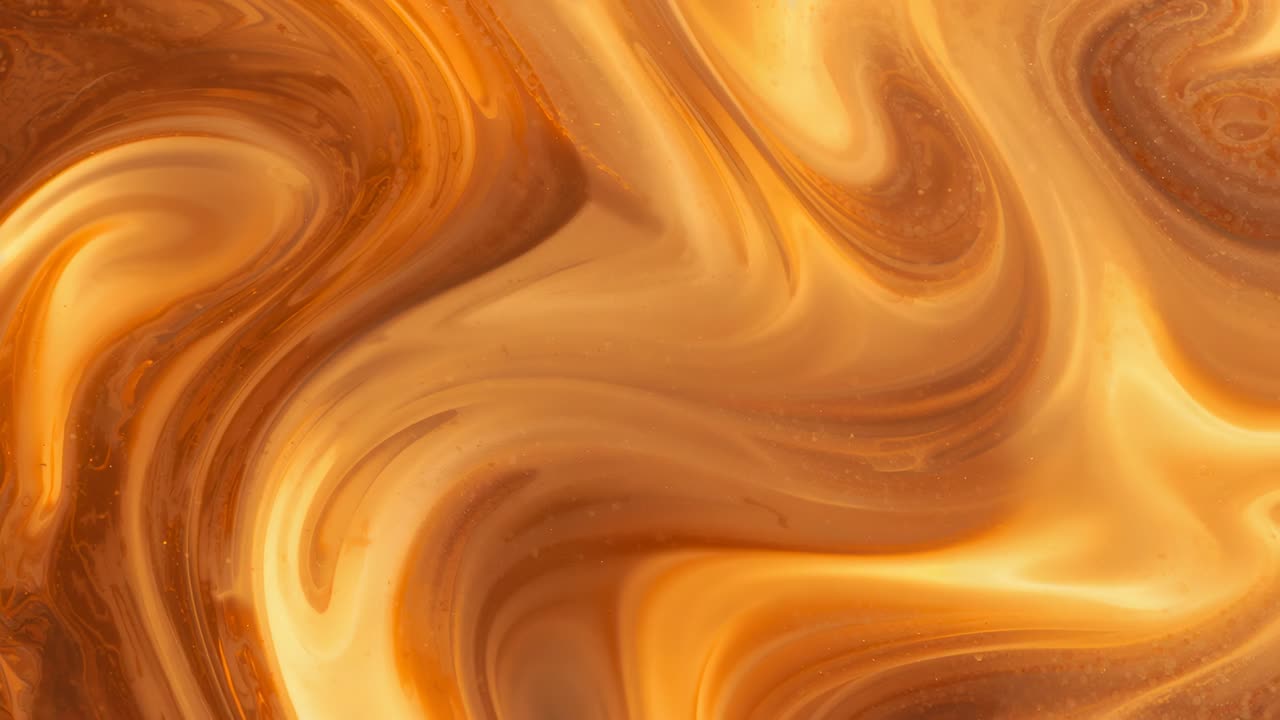 Flowing marbled swirl pattern moving on screen as loop starts, with gold highlights and dark veins