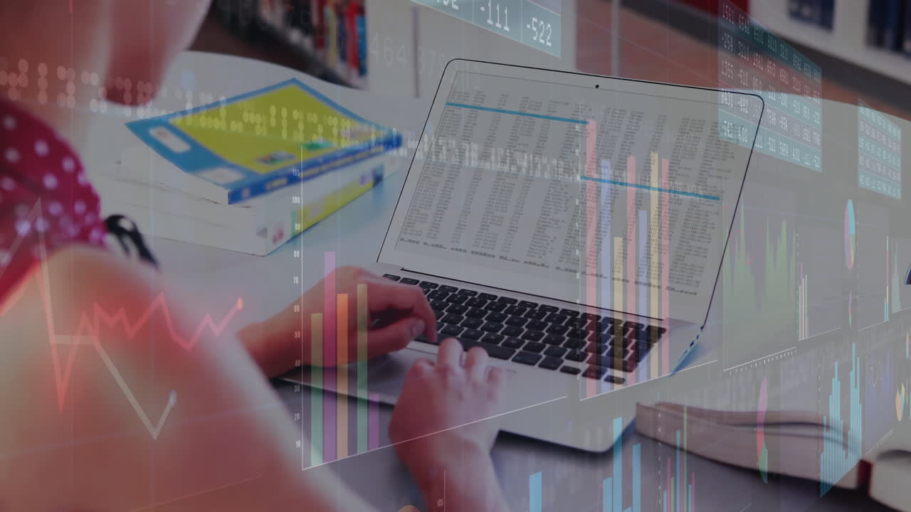 Working on laptop, person analyzing financial data charts with animation overlay