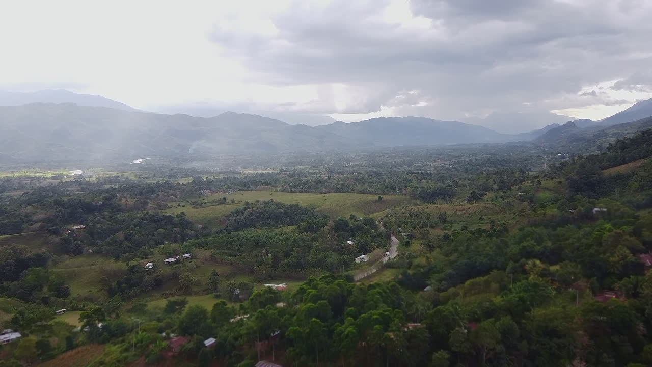 Aerial View of a Lush Green Valley in the Mountains