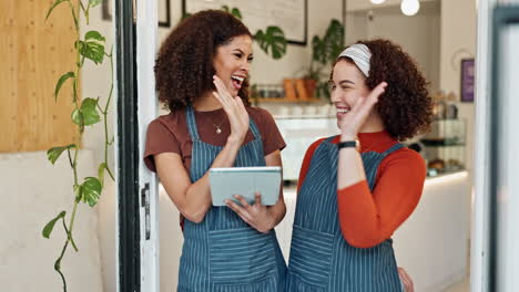 two happy women running their small business