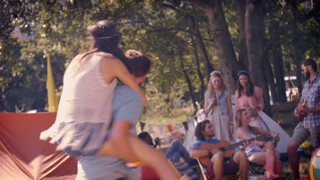 In-high-quality-format-hipster-couple-having-fun-on-campsite