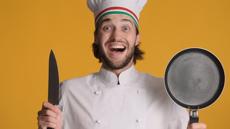 caucasian man in front of camera on yellow background.