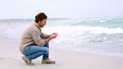 man looking out to sea