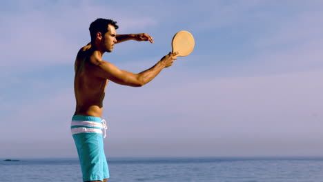 man playing with racket