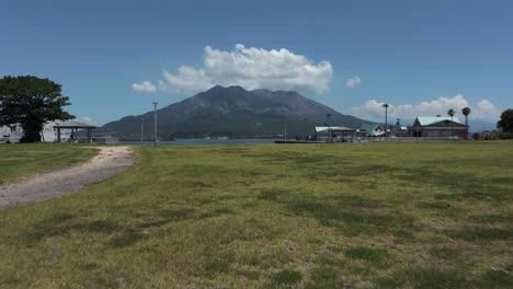 sakurajima in background, push shot towards japan active volcano