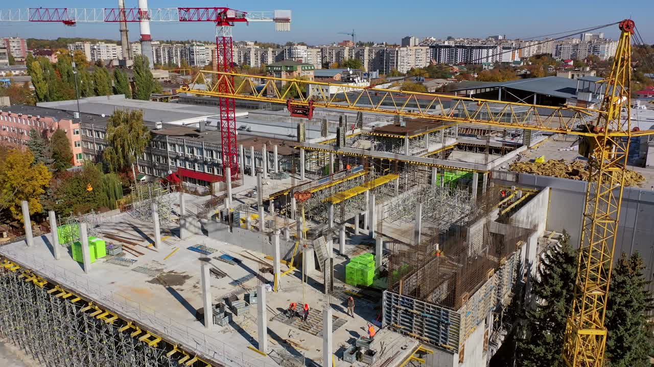 Construction site with cranes. Aerial view of construction site with crane and building