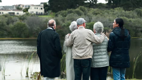 group of people enjoying the lake view