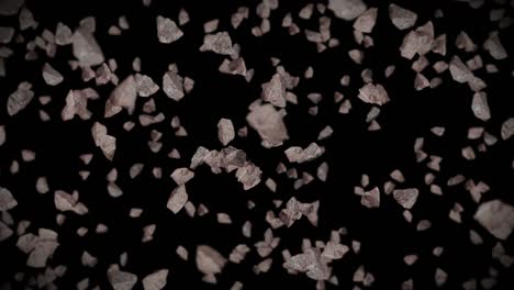 flying many rock stone on black background. broken splash explosion. challenge concept. 3d animation of stone splash rotating. loop animation.