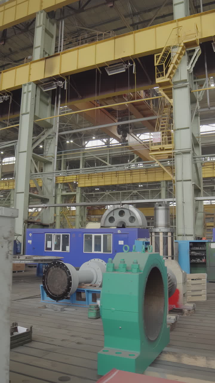 Industrial Facility with Machinery and Cranes