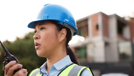 Asian-woman,-architect-and-walkie-talkie