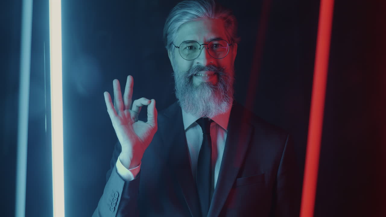 Businessman Making an Ok Sign in Neon Light