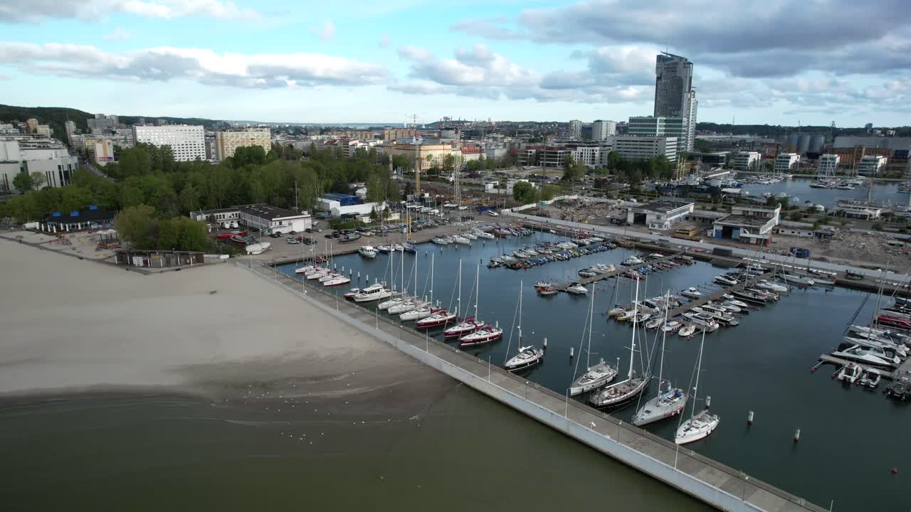 Cityscape of Gdynia, with harbour and high rise buildings. Polish coastal city