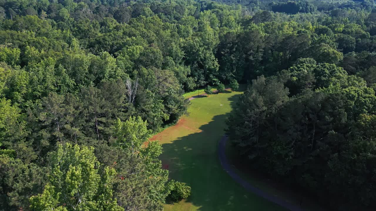 Atlanta urban park running and cycling trail, dense trees, Georgia, Aerial