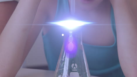 animation of glowing lights over caucasian girl with pipette and chemistry beaker