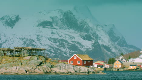 stunning shot stockfish drying and traditional buildings in reine, lofoten