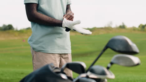 african american man on the golf course.